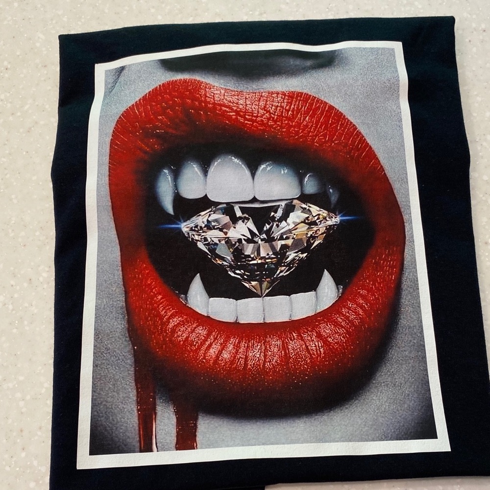 New unisex “ Diamond fangs “
